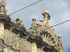 Green and white stonework at top of Aragon theater