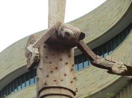 Closeup of animal at top of totem pole