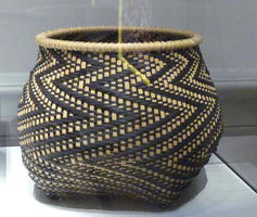 Brown and beige woven reed basket