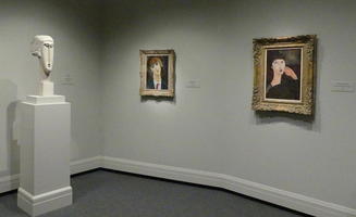 Statue and two paintings by Modigliani