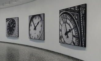 Large photos of clocks set at 1:55.