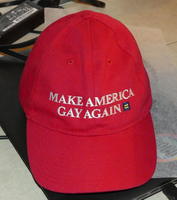 Cap with lettering “Make America Gay Again”