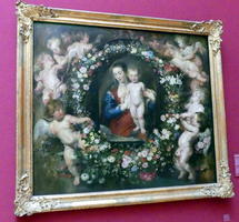 Madonna and child surrounded by cherubs.