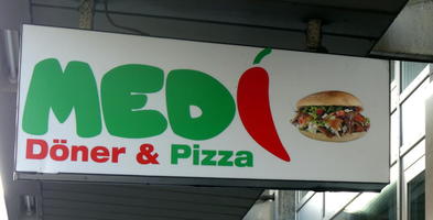 Logo with red chili pepper representing the letter “i” in “Medi”