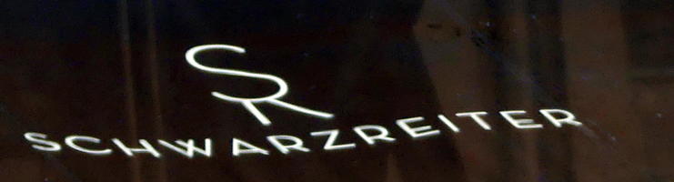 Logo showing a combined S and R for Schwarzreiter restaurant