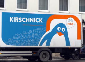 Logo with penguin that is blue and white with orange beak.