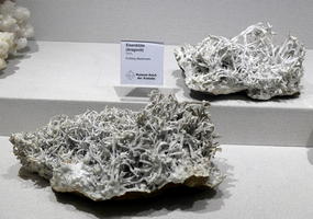 Aragonite crystals that look like white tangled grass