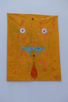 Abstract face on orange background