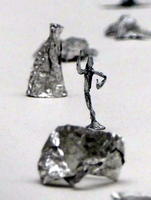 Aluminum foil figure of standing person