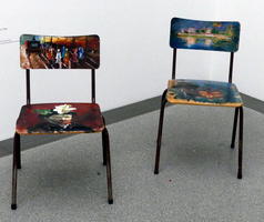 Wooden chairs with impressionist paintings on seat and back