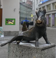 Bronze boar outside a butcher shop