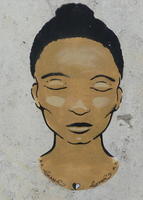 Head of African woman with eyes closed