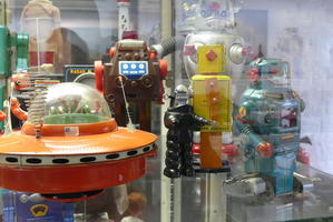Toy robots and orange flying saucer
