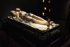 Full-scale sculpture of dead hrist lying on back