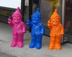 Purple, blue, and orange gnomes giving the finger