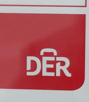 Letters DER with luggage handle over E