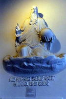 Sculpture of god with Genesis 1:1 beneath