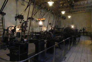Dimly lit room with old manufacturing equipment