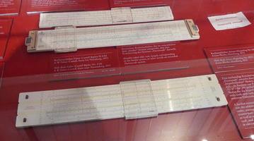 Display with three slide rules
