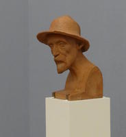 Bust of bearded old man in straw hat