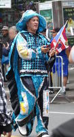Man in blue sequined suit
