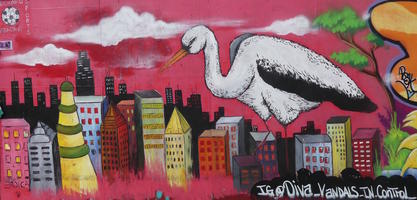 Giant stork above cityscape
