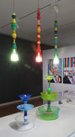 Colored hanging lamps and vases
