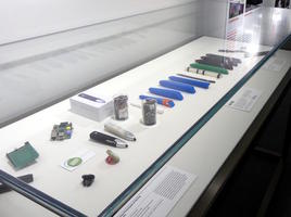 Display case showing evolution of digital pen at museum