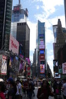 Long view of Times Square showing building with electronic ads