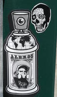 Spray paint can labeld “Alex25”; skull to upper right