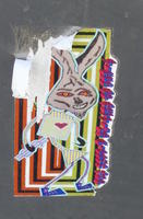 Creepy looking rabbit holding a $ symbol