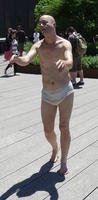 Lifelike sculpture of sleepwalking man in underwear