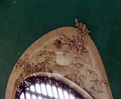 Sculpture of tree branch in niche at Grand Central