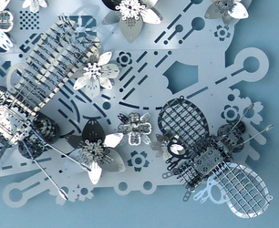 detail of insects made of metal with grid-like wings