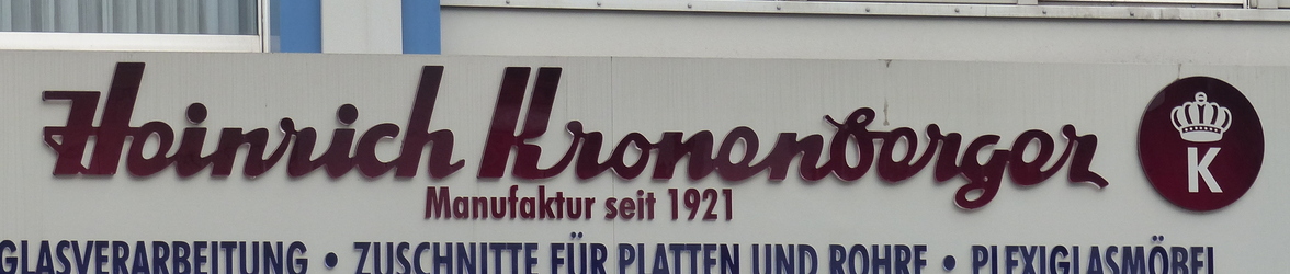 Script style store sign: Heinrich Kronenberger