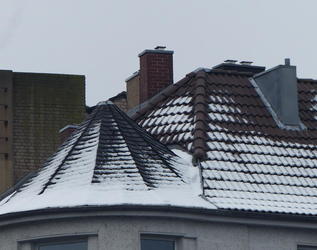 Snow-covered conical roof