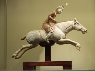 chinese rider on galloping horse