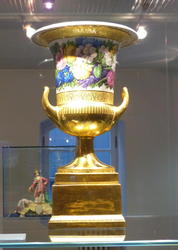gold vase with floral decoration