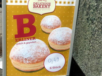 Berliner filled and powdered doughnuts; B on one line, “ERLINER” on next.