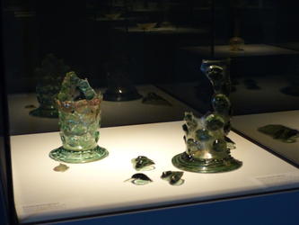 Archaeologically complete glass; glass items restored from broken glass.