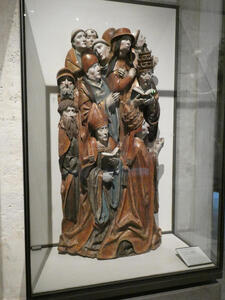 Two popes, a cardinal, a bishop, a canon, and seven monks in prayer (painted sculptue)