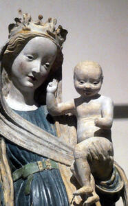 Painted sculpture of Mary and infant Jesus.