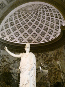 Greek godess under domed ceiling.