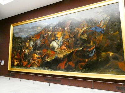 Wall-sized painting of a battle scene