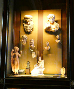 display case of greek busts