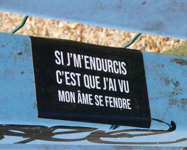 Sticker with translated text: “If I have become hard, it is because I have seen my soul splitting.”