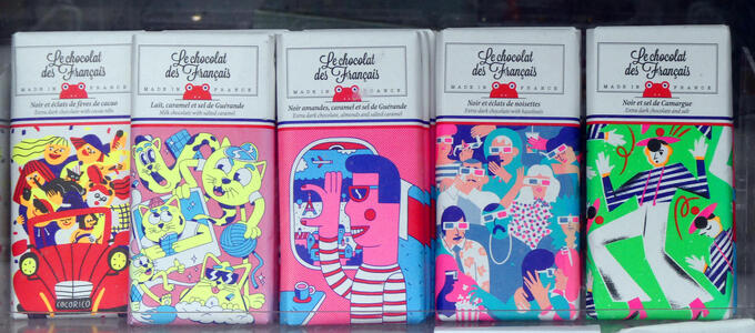 Chocolate bars with whimsical drawings on the wrappers