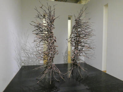 symmetrical sculptures of tree branches
