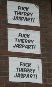 Three large stickers with text: Fuck Thierry Jaspart