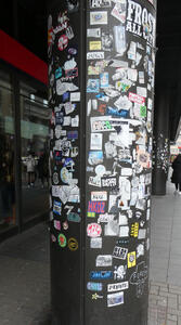 Cylindrical pillar covered with stickers